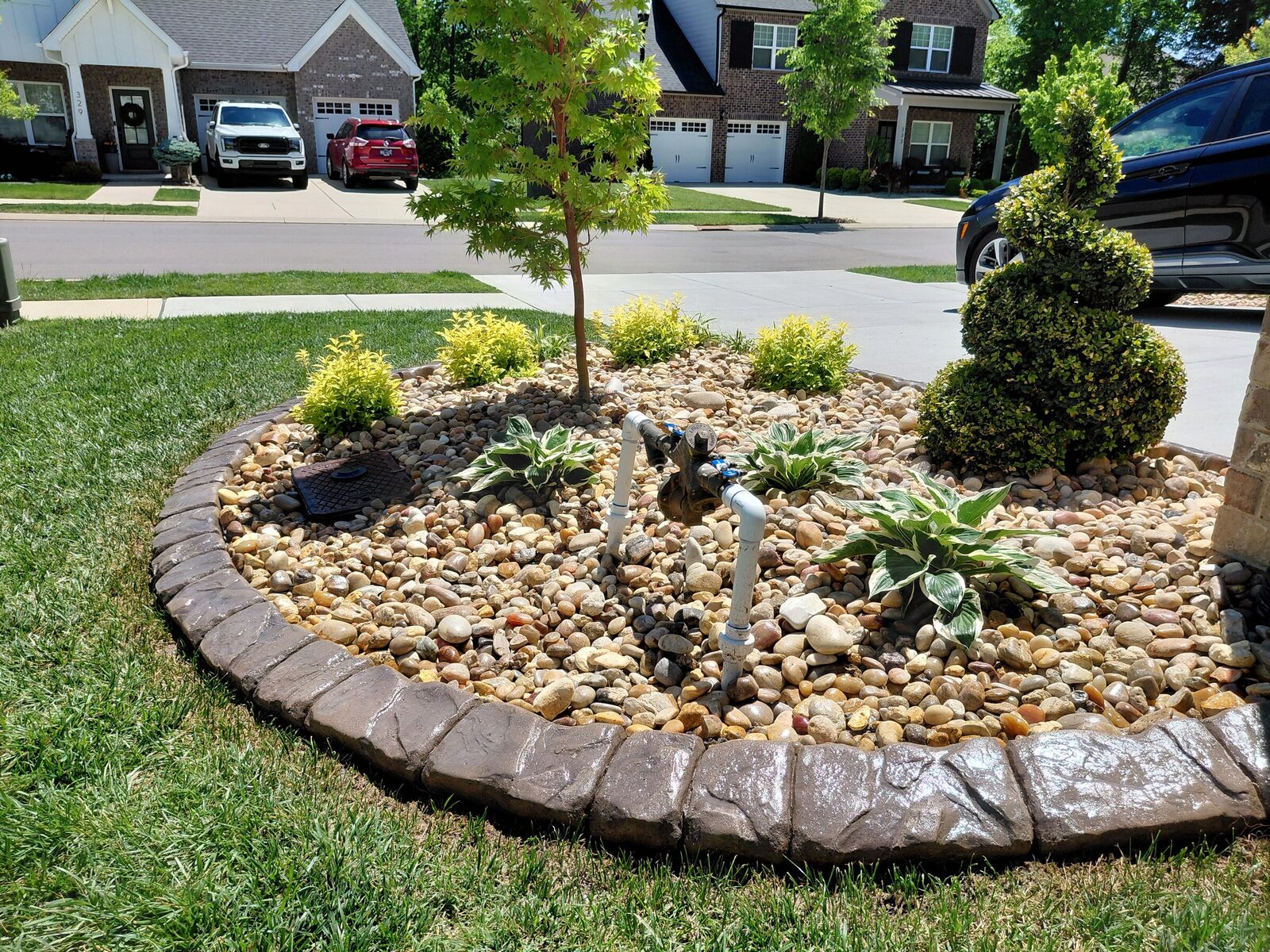 River-rock island with topiary, Chattanooga Rock pattern