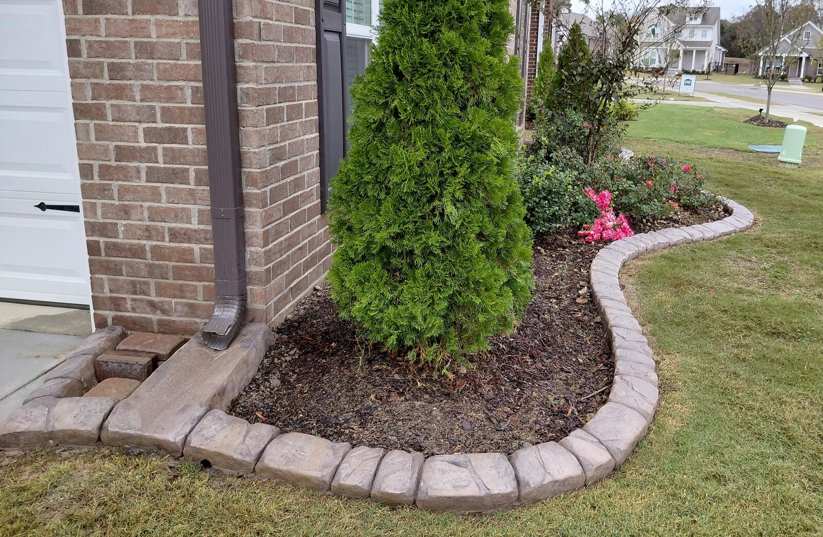 Rose bed at the garage corner, Chattanooga Rock pattern