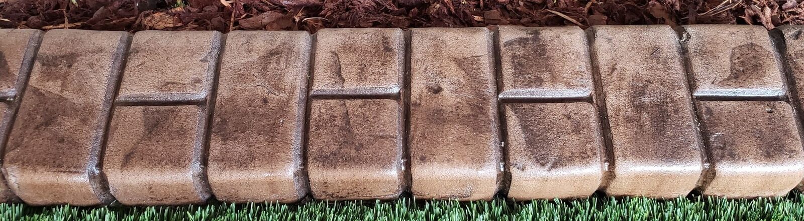 Brick Half Brick stamp pattern pressed into a curb