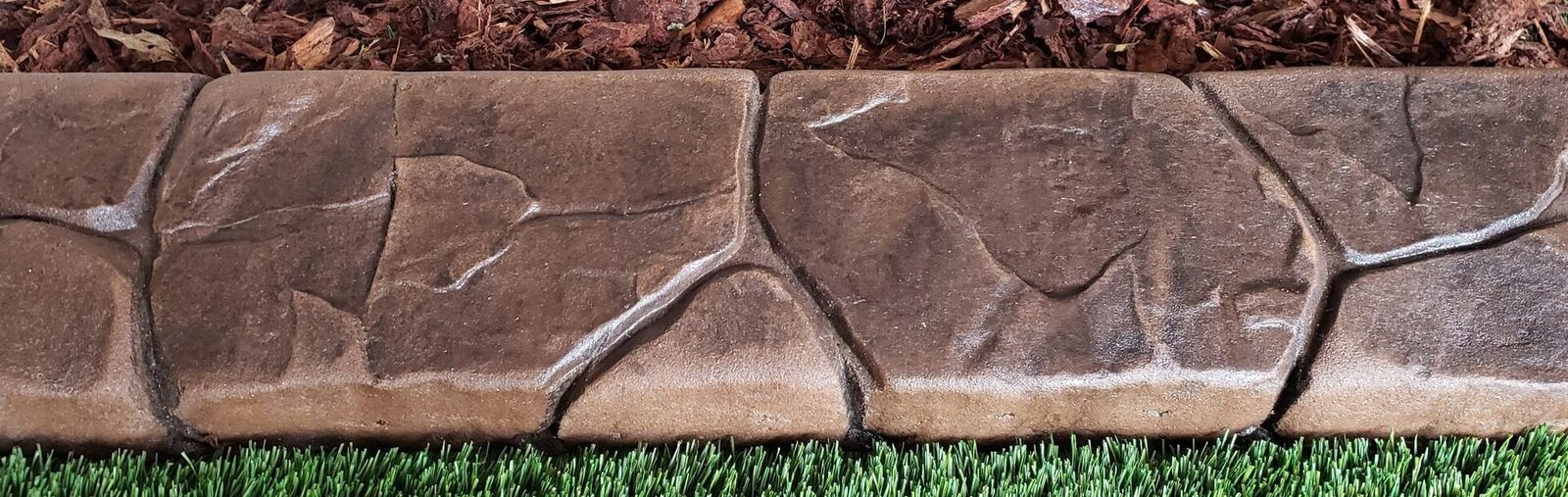 Random Stone stamp pattern pressed into a curb