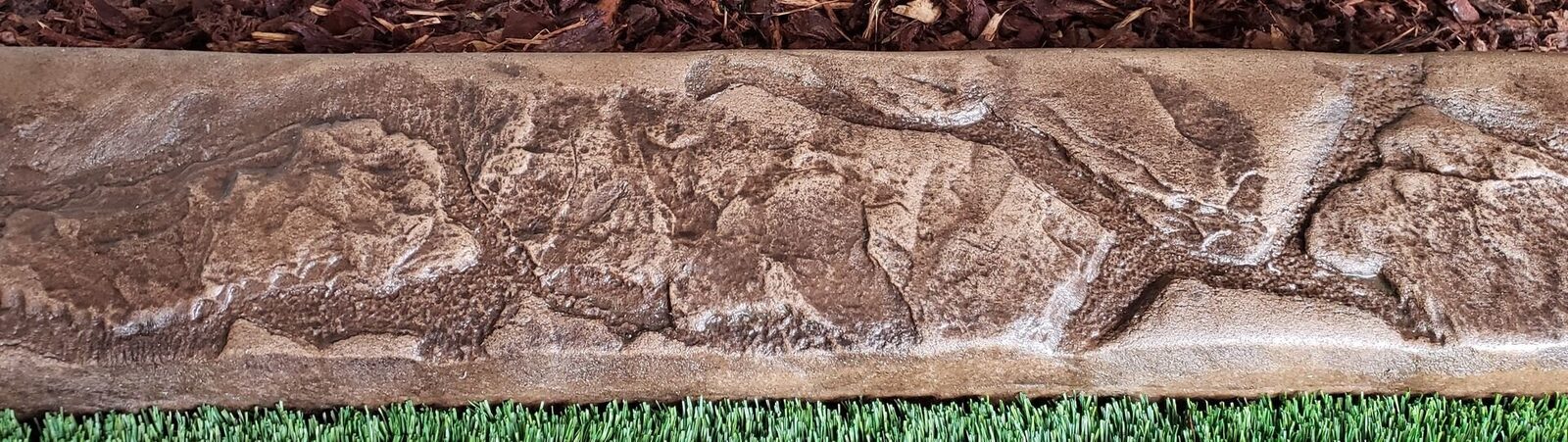 Slate stamp pattern pressed into a curb